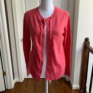 Bright pink cardigan